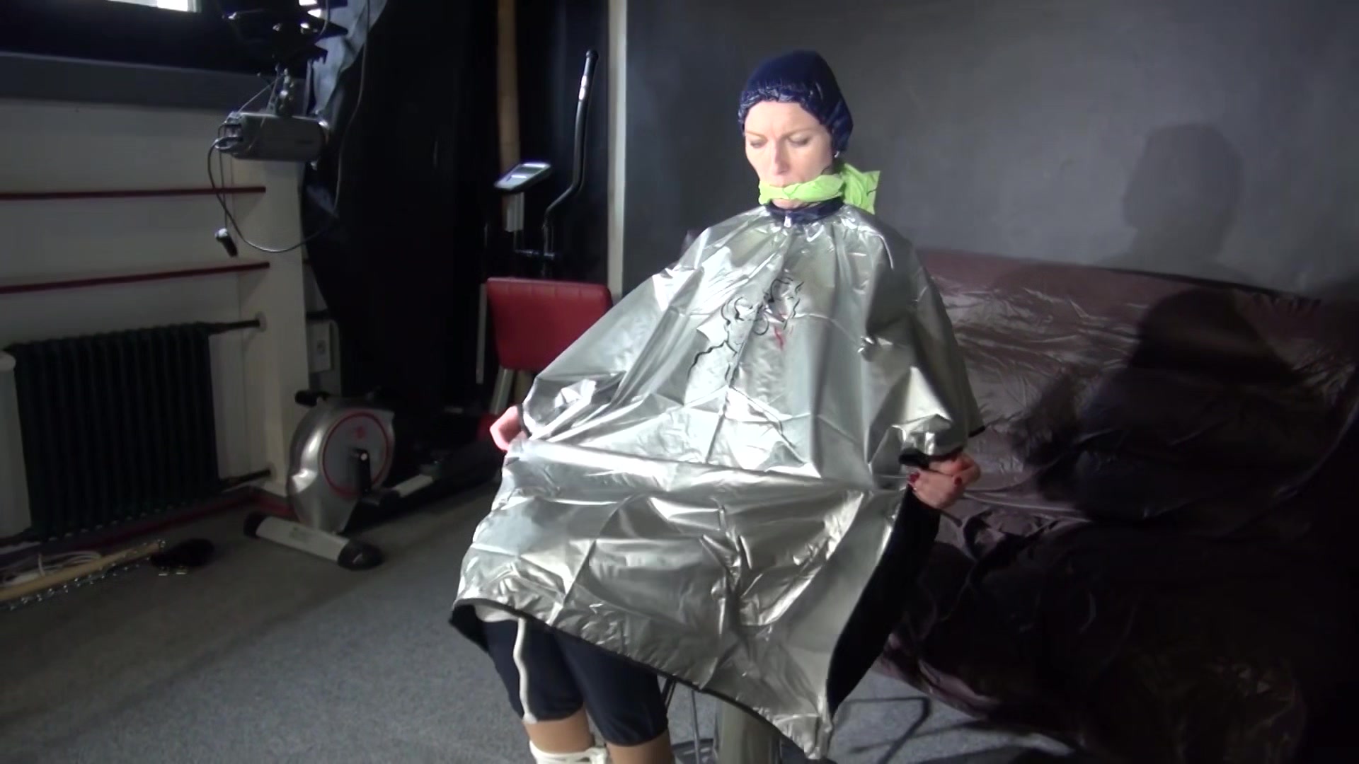 Sexy Ronja Being Tied, Gagged And Hooded On A Chair With A Clothgag Wearing Sexy Blue Shiny Nylon Rainwear (Video)