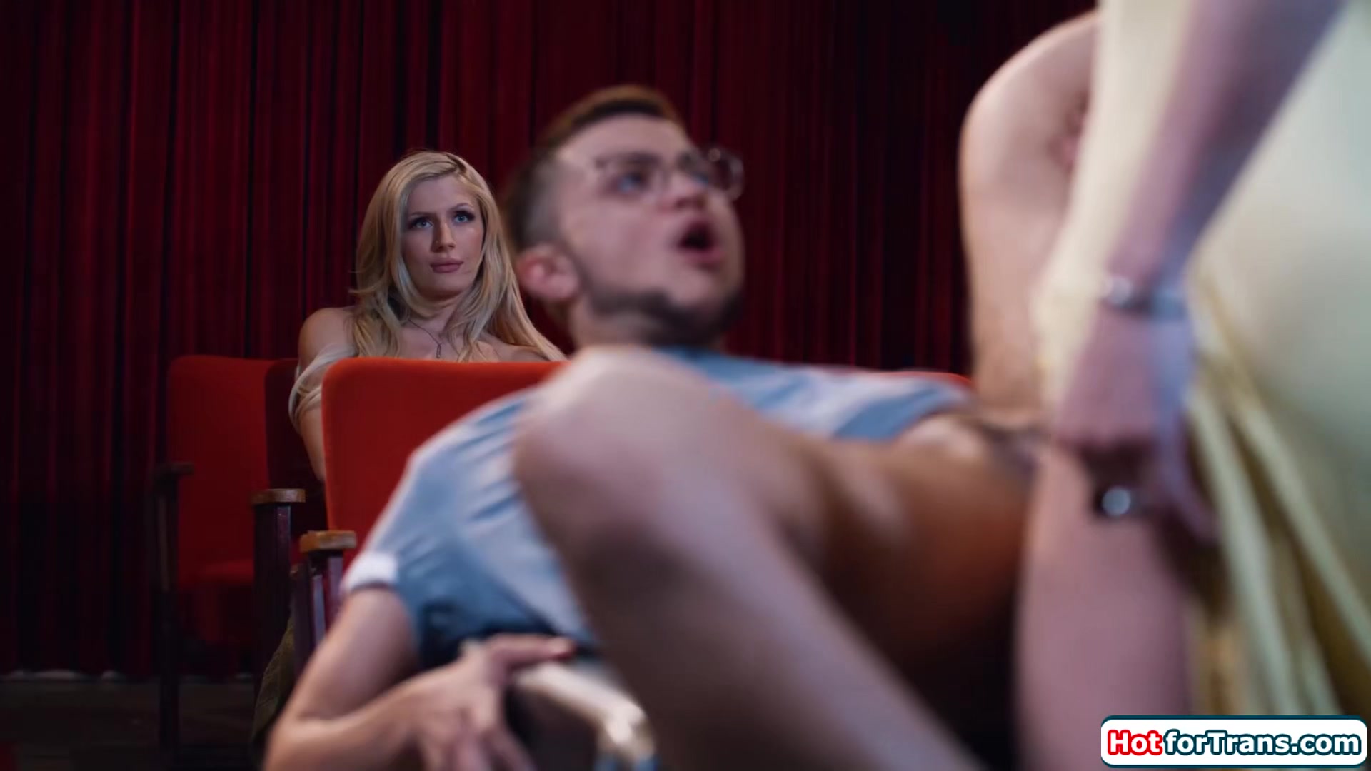 Two big tits shemales fuck a trans mans pussy at the cinema