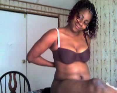 Black girl shows her sweet chocolate skin for the camera