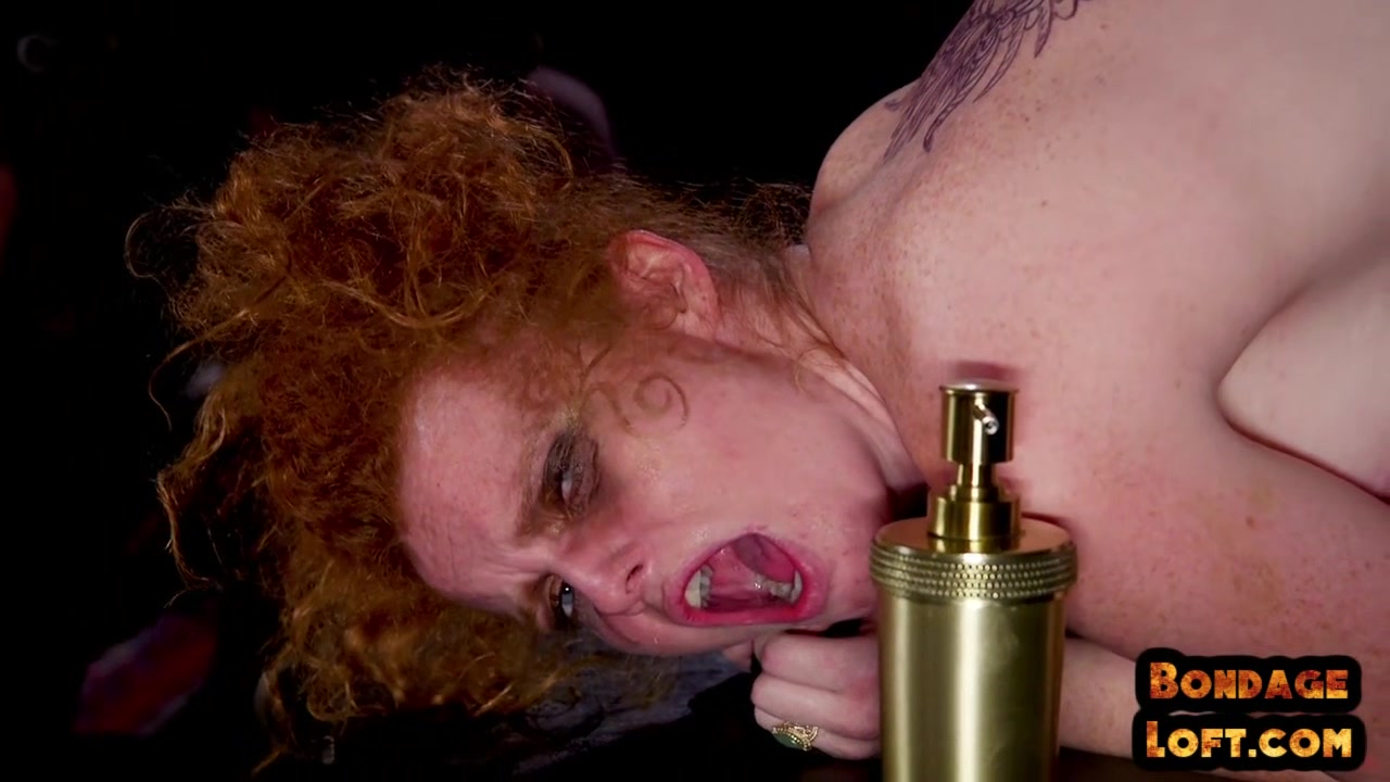 Curvy mistress fisting black sub during domination session
