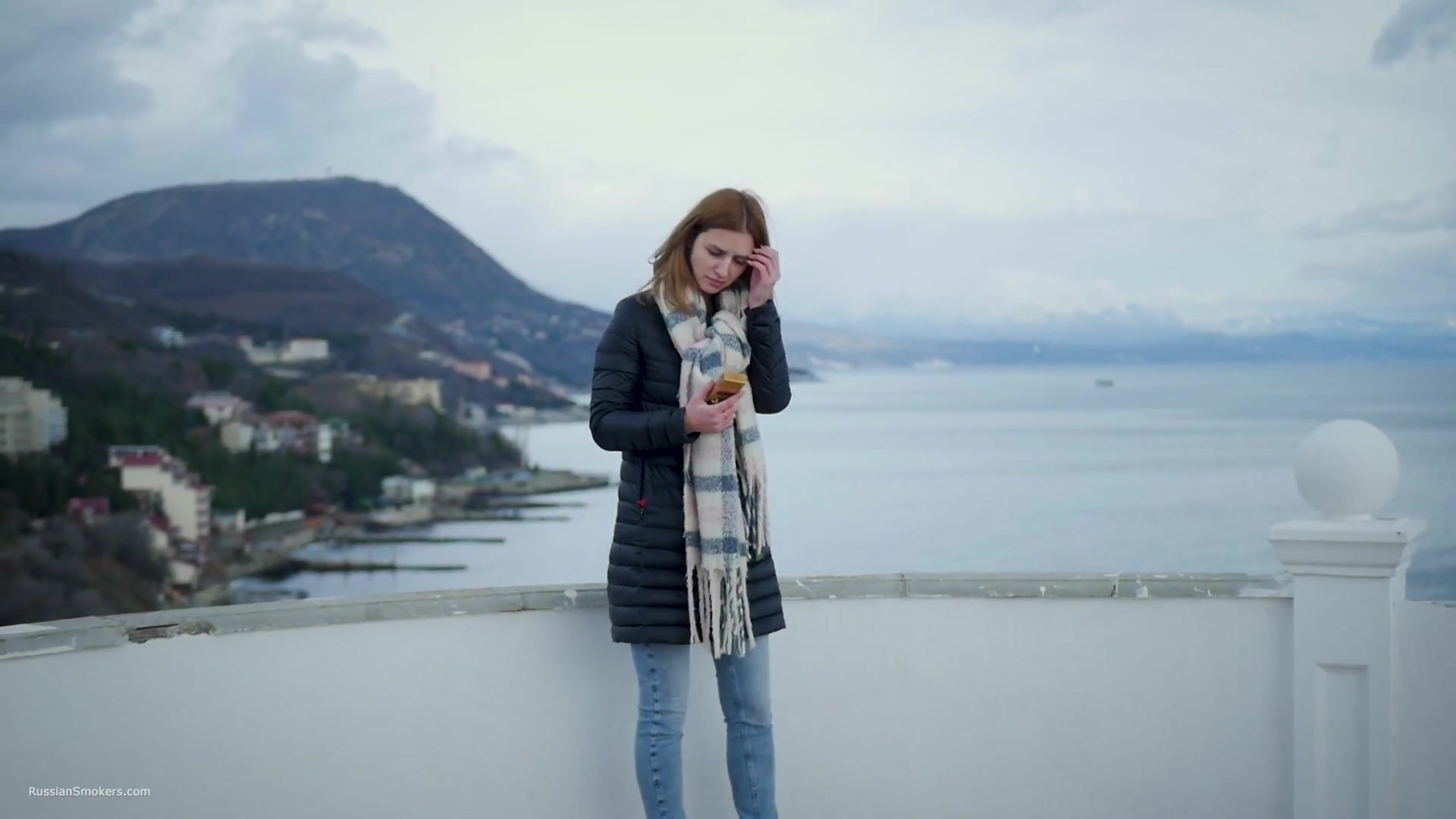 Beautiful Lady Is Smoking Two Saratoga Cigarettes In A Row On A Beautiful View