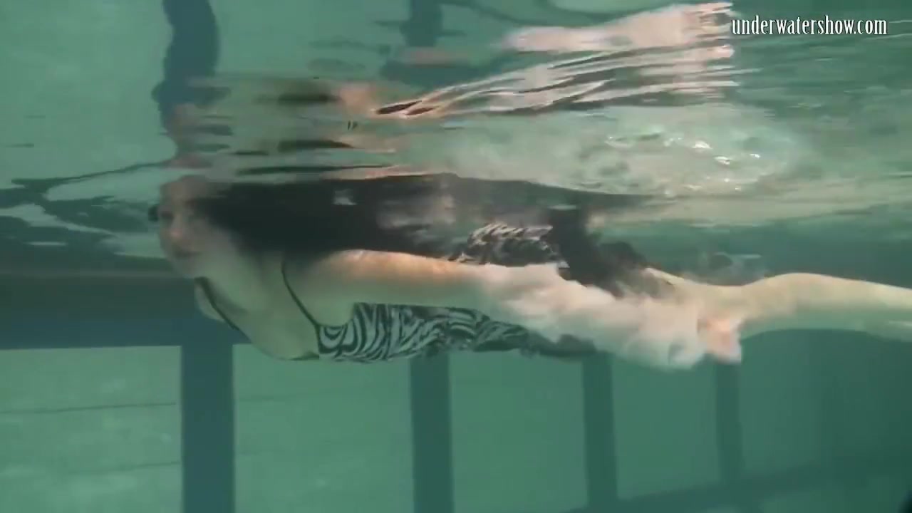 Dressed Up teen 18+ Irina Barna Swims Sexy In The Pool