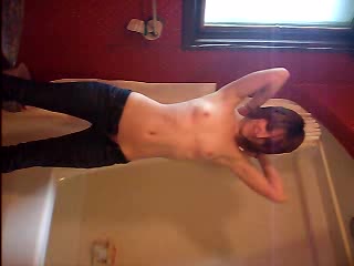Skinny emo chick strips and touches her nice pussy