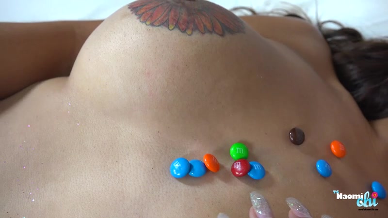Busty TS Naomi Chi gets a Handjob while covered in MMs