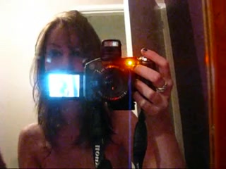 Mirror selfshot made by a naked slim-fit chick