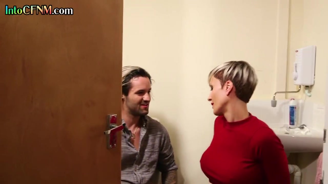 CFNM British MILF with tattoos gives toilet HJ to lucky man