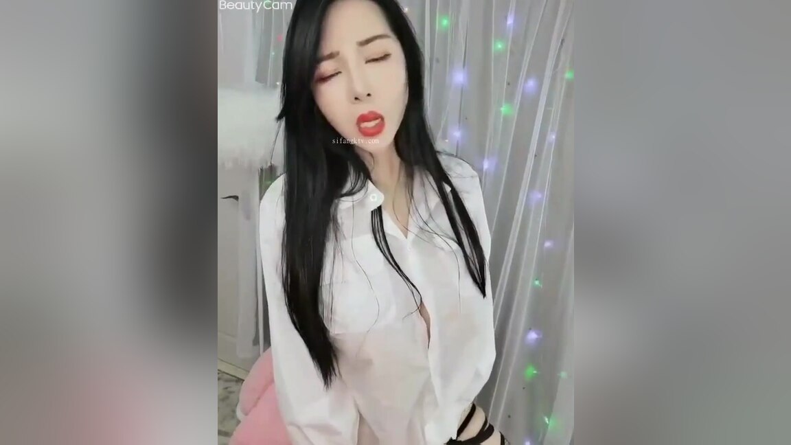Beautiful Asian Babe Playing On Camera
