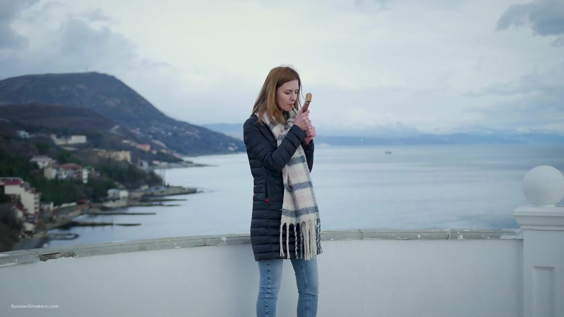 Beautiful Lady Is Smoking Two Saratoga Cigarettes In A Row On A Beautiful View