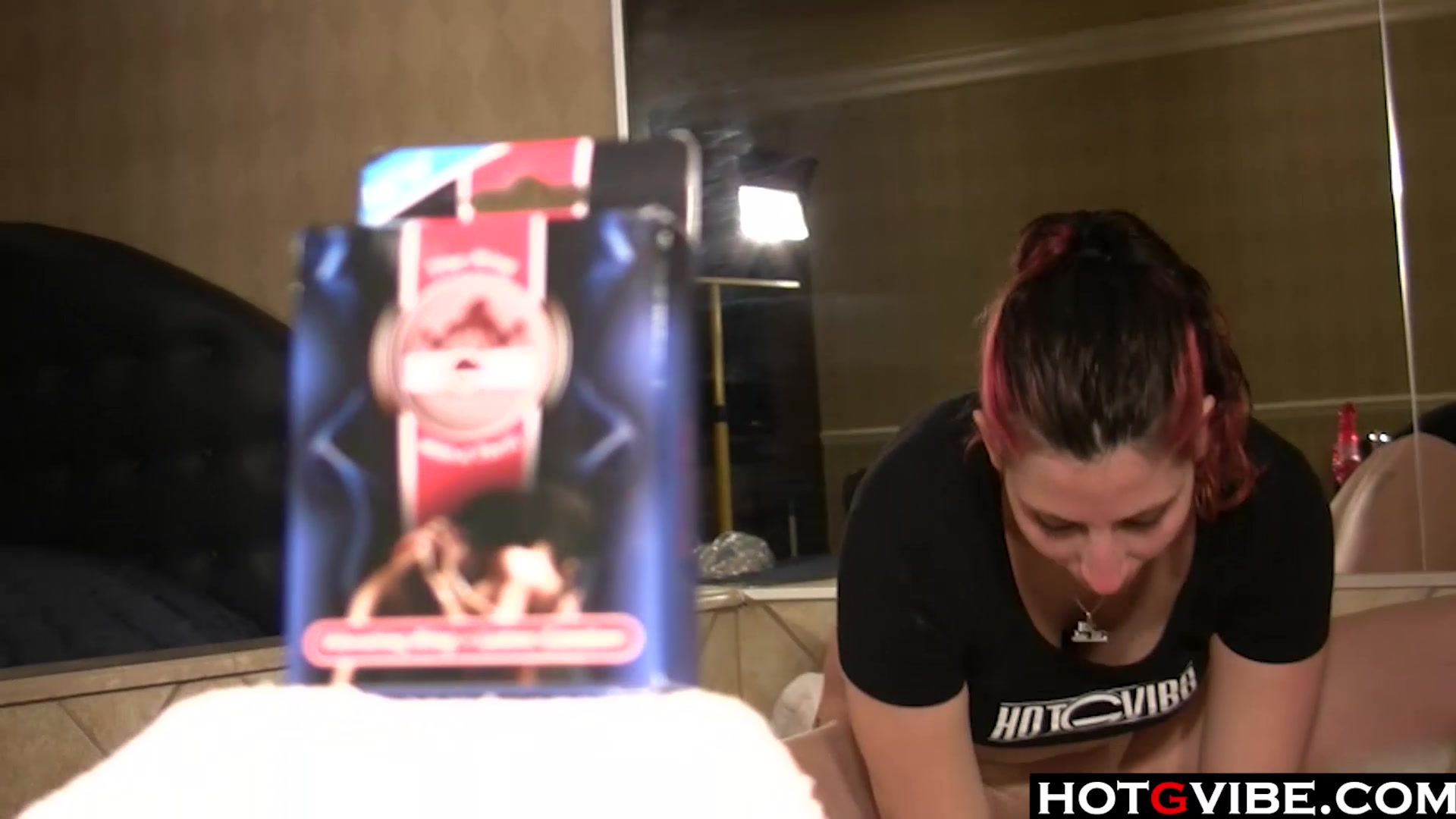 Solo redhead works her pussy