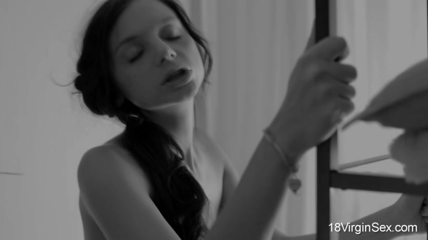 18 year old Ludmila works her boyfriend's massive pole during virgin sex.