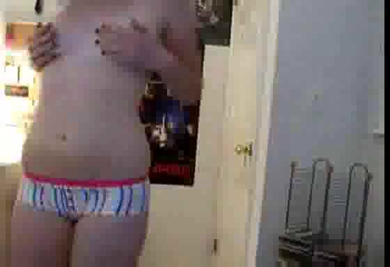 Pussycat poses in front of the webcam in stripped undies