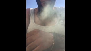 Masked Ebony BBW smoking, sucking & playing with in garden