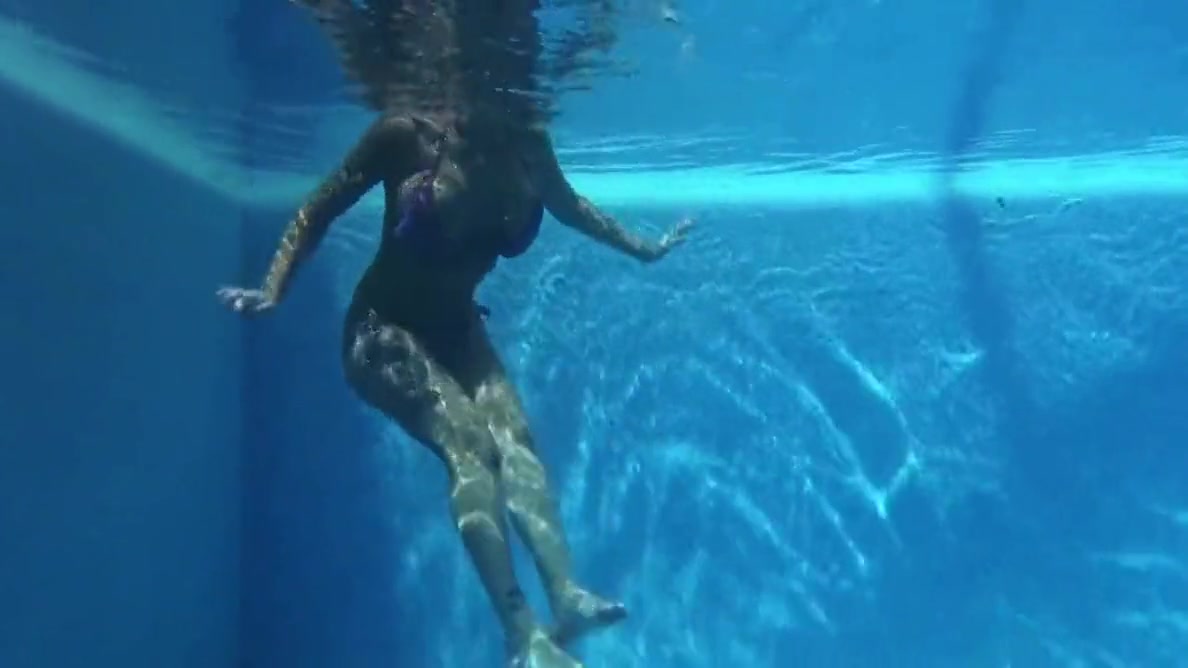Pornstar Swims Naked In The Pool