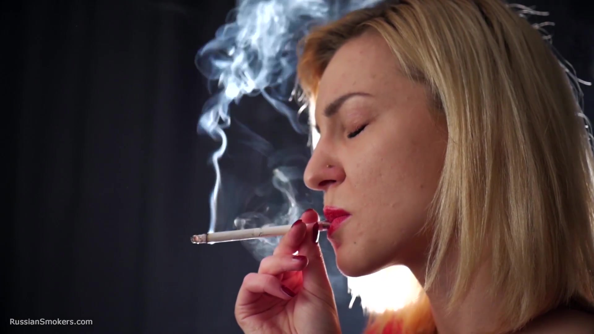 Many Many Nose Exhales With Cork Cigarette