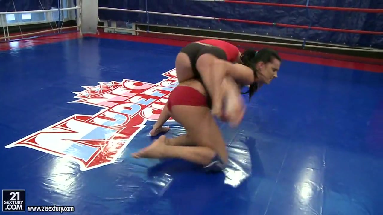 Dorina Golden and Melissa Ria wrestle in the ring
