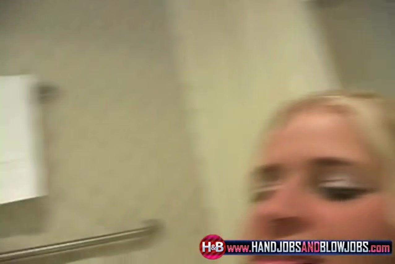 Nicole gives a handie in the bathroom