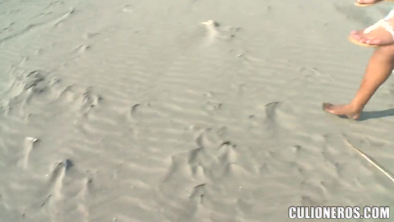 Sexy swimming costume of Sandra turns on her male friend on the seashore