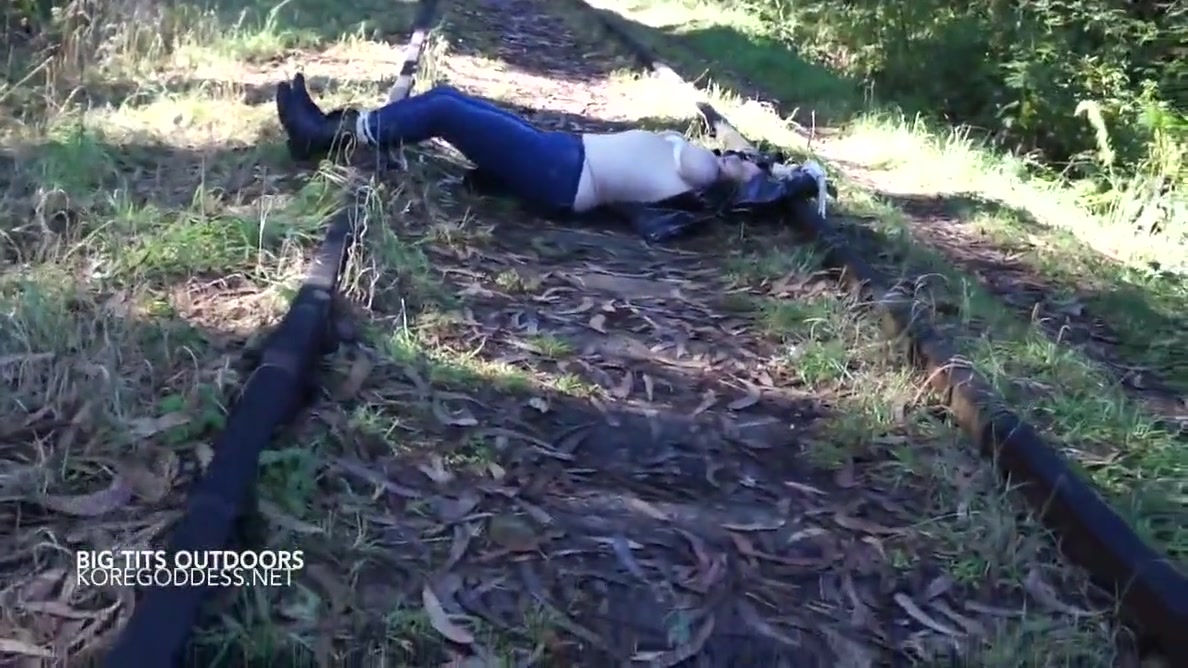 Tied Up In The Woods And The Train Line With Huge Breasts