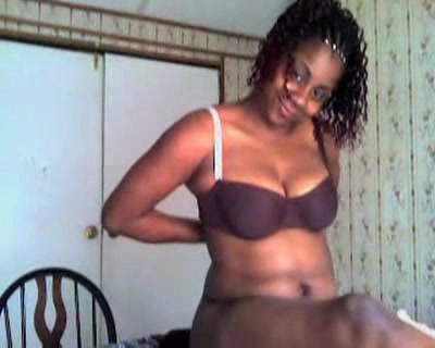 Black girl shows her sweet chocolate skin for the camera