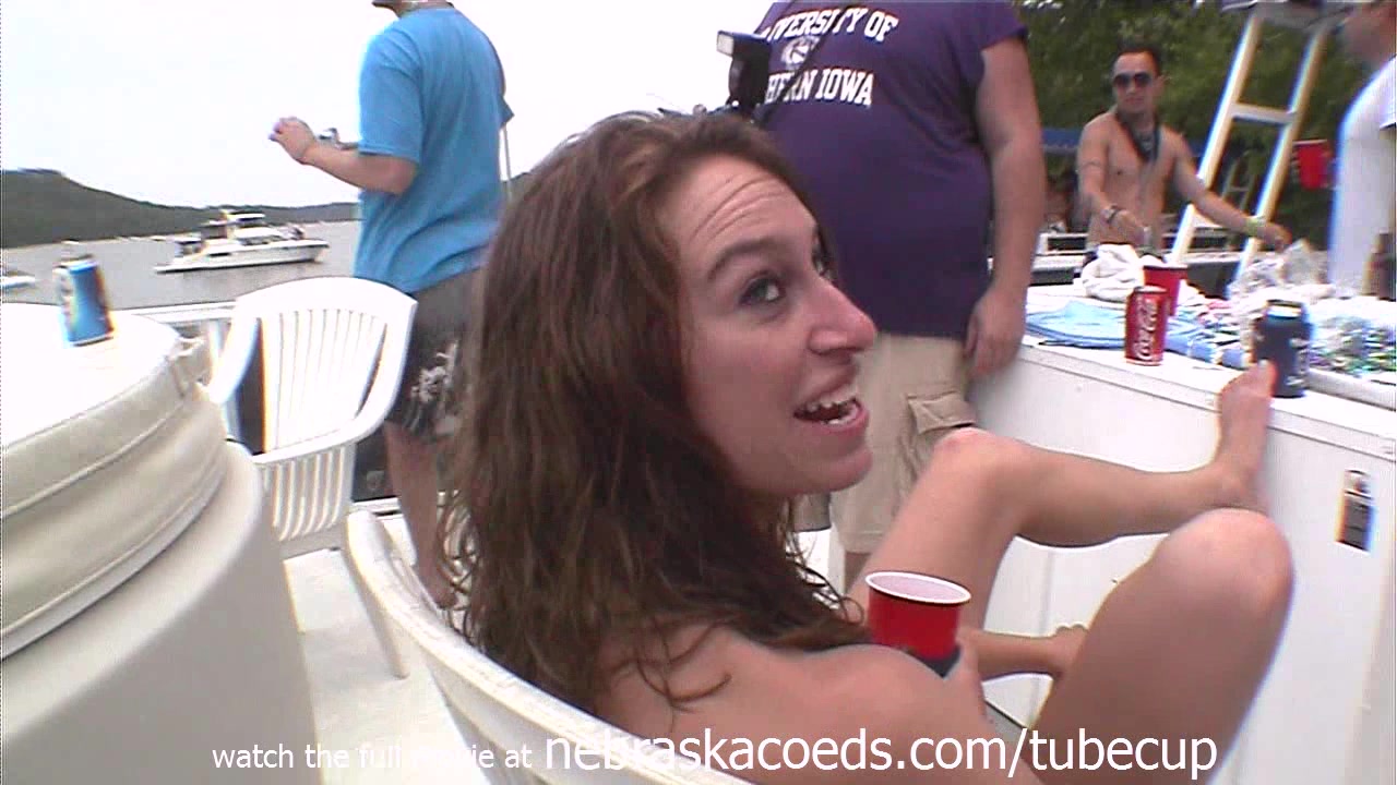 drinking beer out of plastic cocks while partying