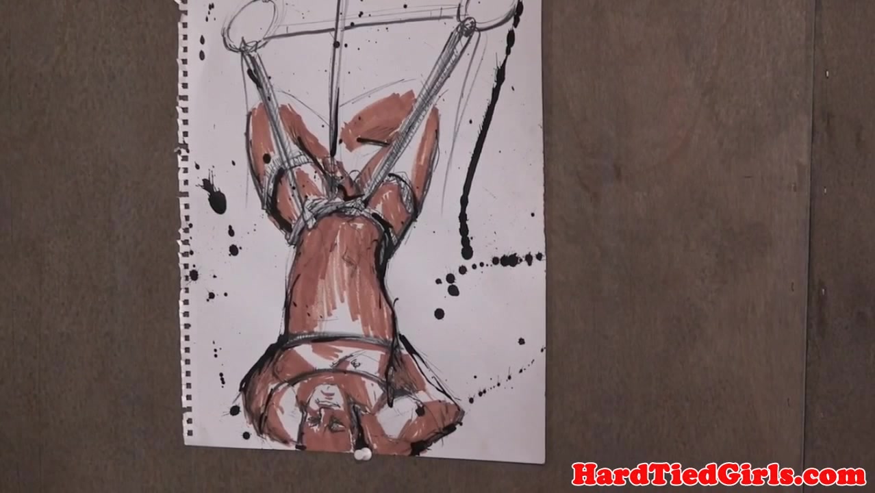 Suspended artist whipped in maledoms dungeon