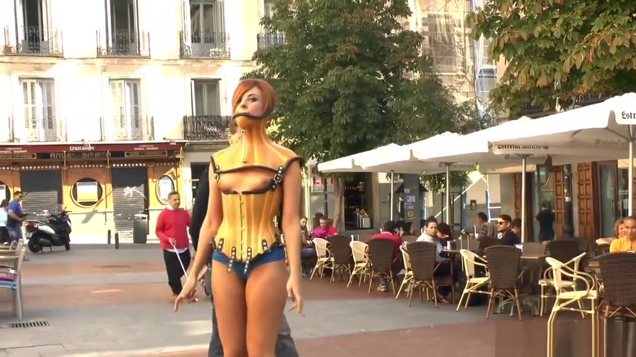 Naked ginger slave led through Madrid