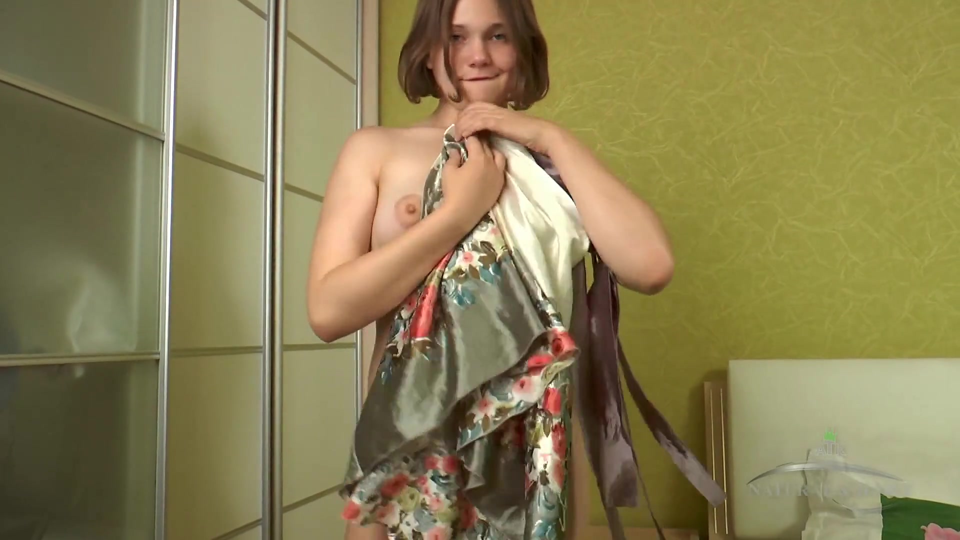 Clarissa Is Having Fun Teasing The Camera In Her Dress
