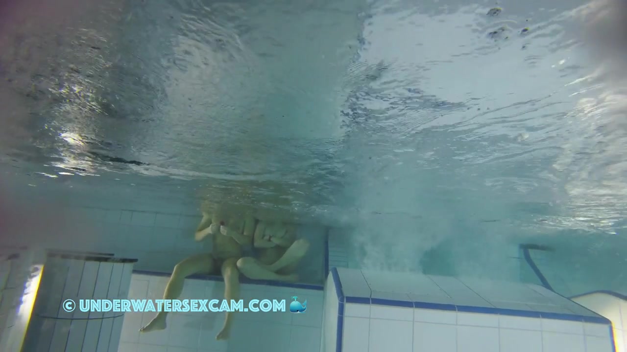 Sporty Couple Regenerating On An Underwater Bench