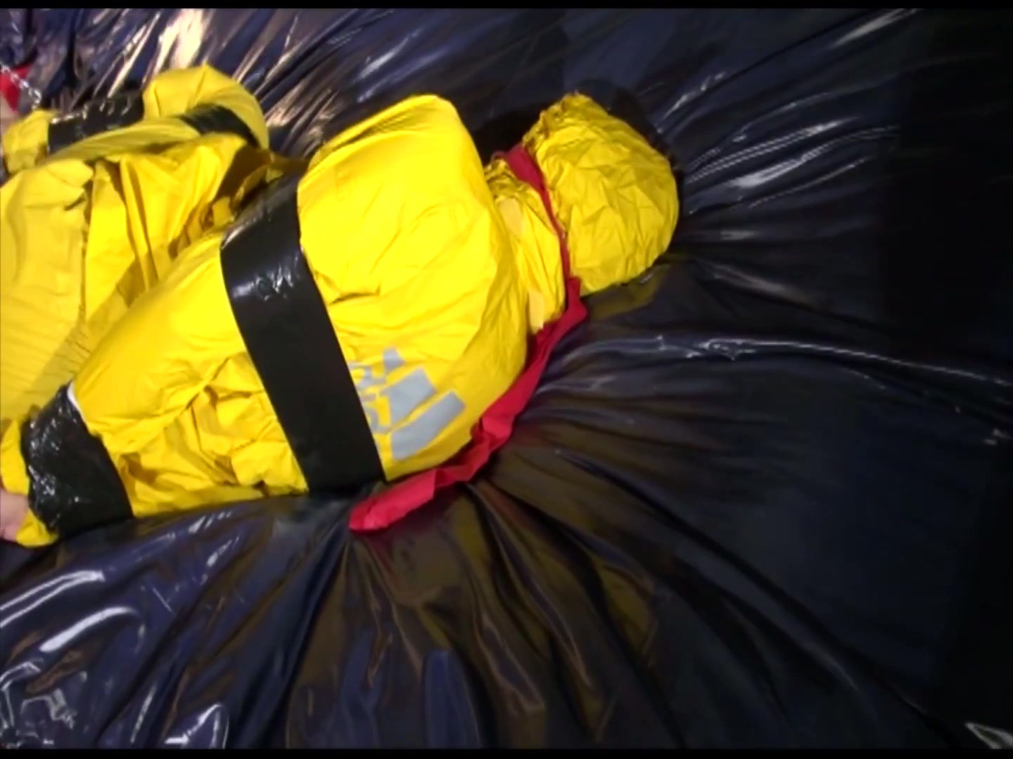 Get 2 Archivevideos With Sonja Enjoying Bondage In Her Shiny Nylon Rainwear