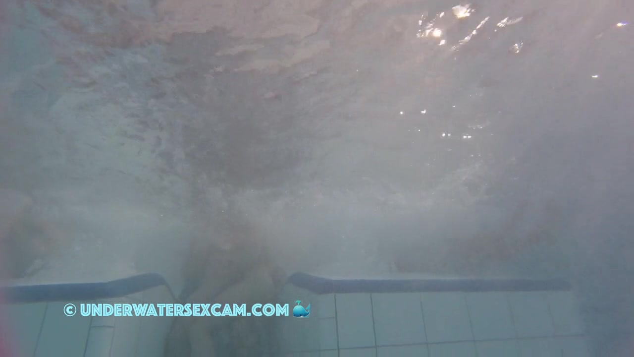 This Young Couple Plays Together Underwater In Front Of Many People