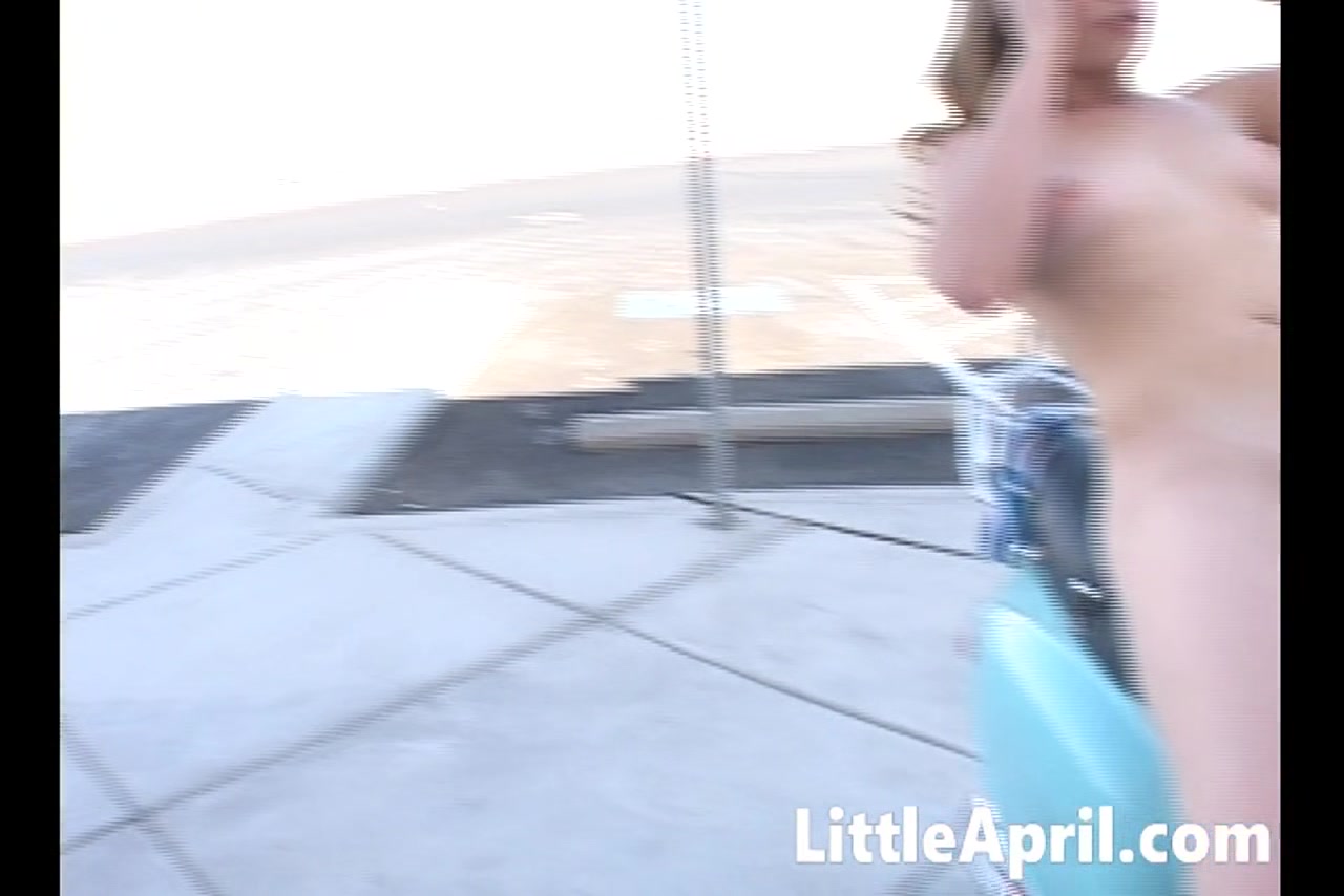Little April masturbates in hot solo scene