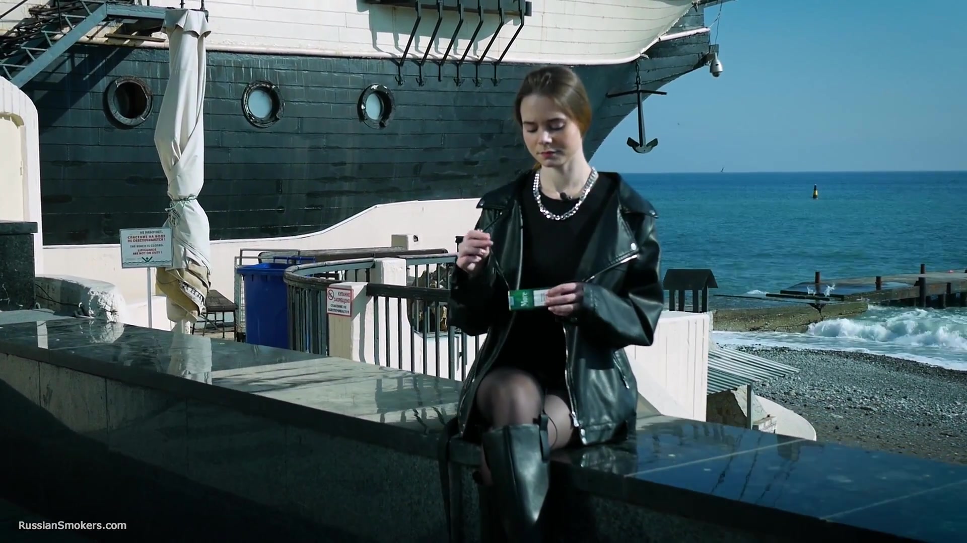 Smoking Strong Brown 120mm Cigarette Near The Beach