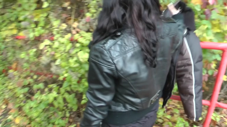 Brunette in funny panties blows cock outdoors