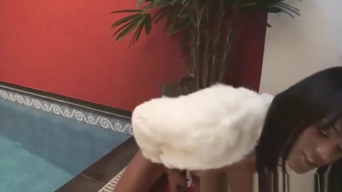 Foxy ebony shemale jerking her hard cock poolside