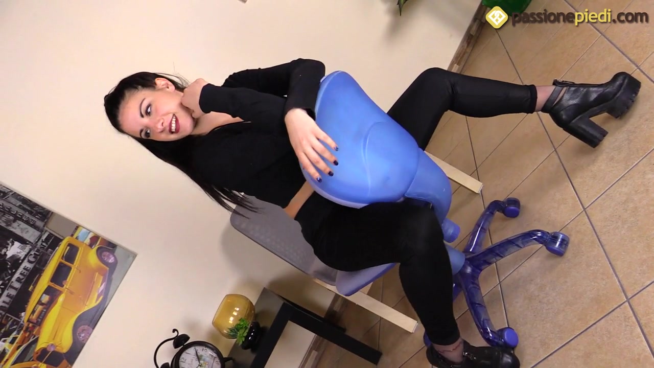 Super-hot Bianca showing off her feet on an office chair