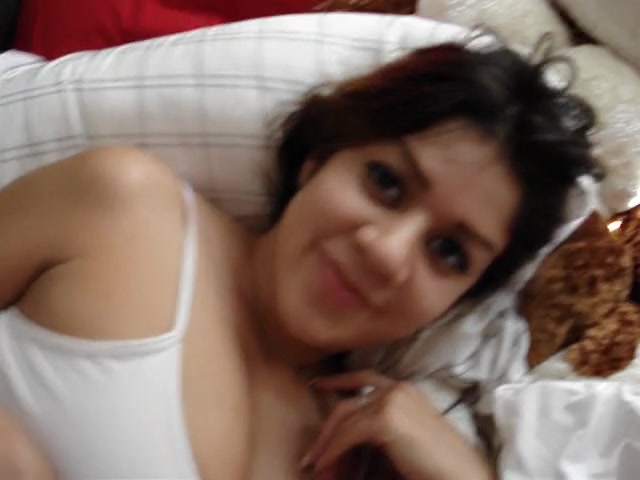 Innocent Latina sucking her boyfriend's cock on bed