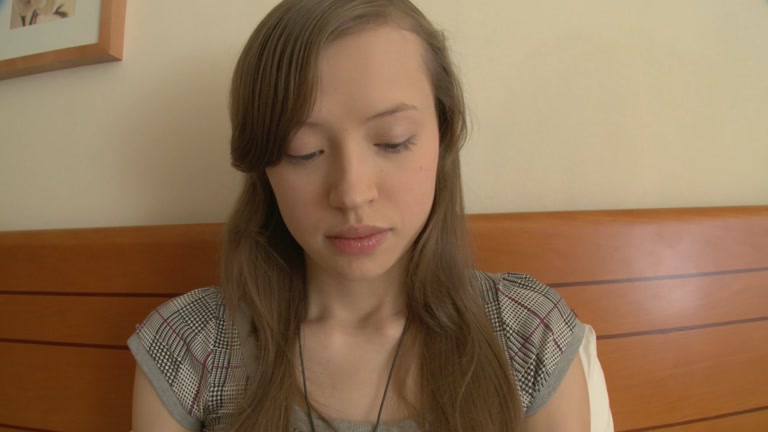 Shy looking cutie widens legs and climbs the piston