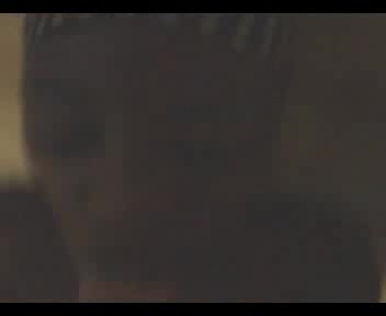 Black hussy in a dotted bandana receives cum in her mouth