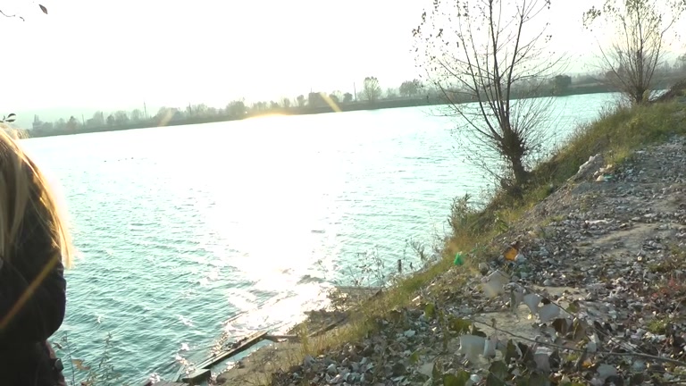 Blonde sucking near the lake