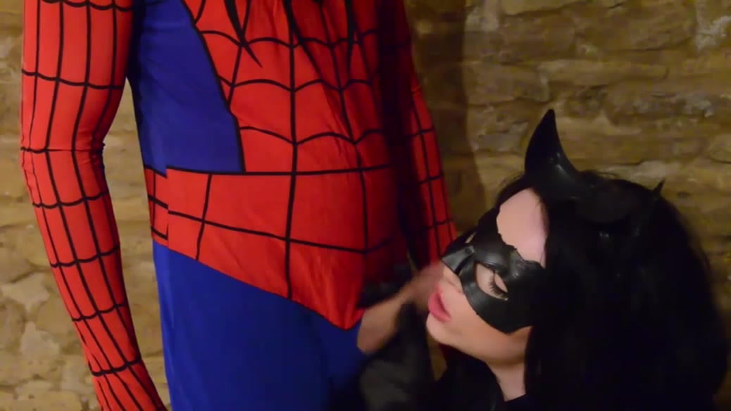 Busty Cosplay Catwoman takes spiderman web