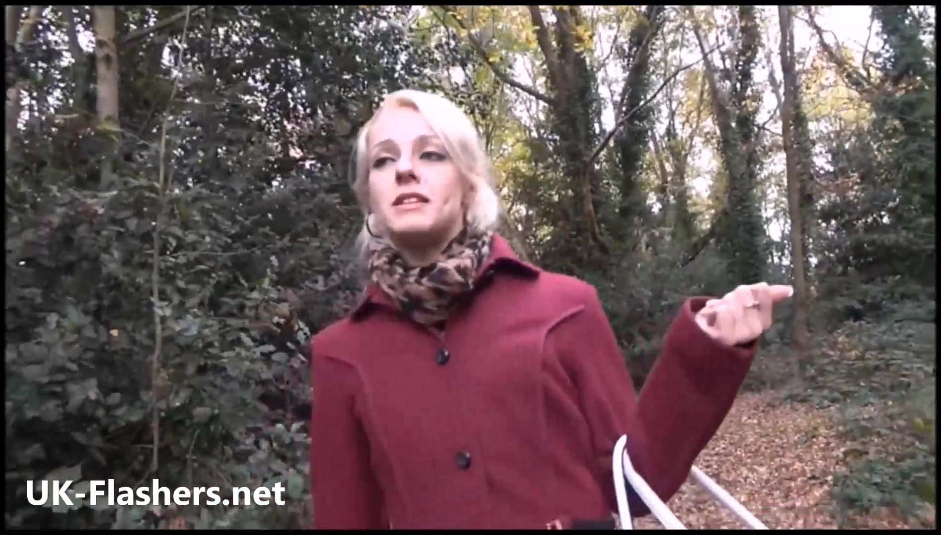 Sexy blonde exhibitionist April strips naked outdoors