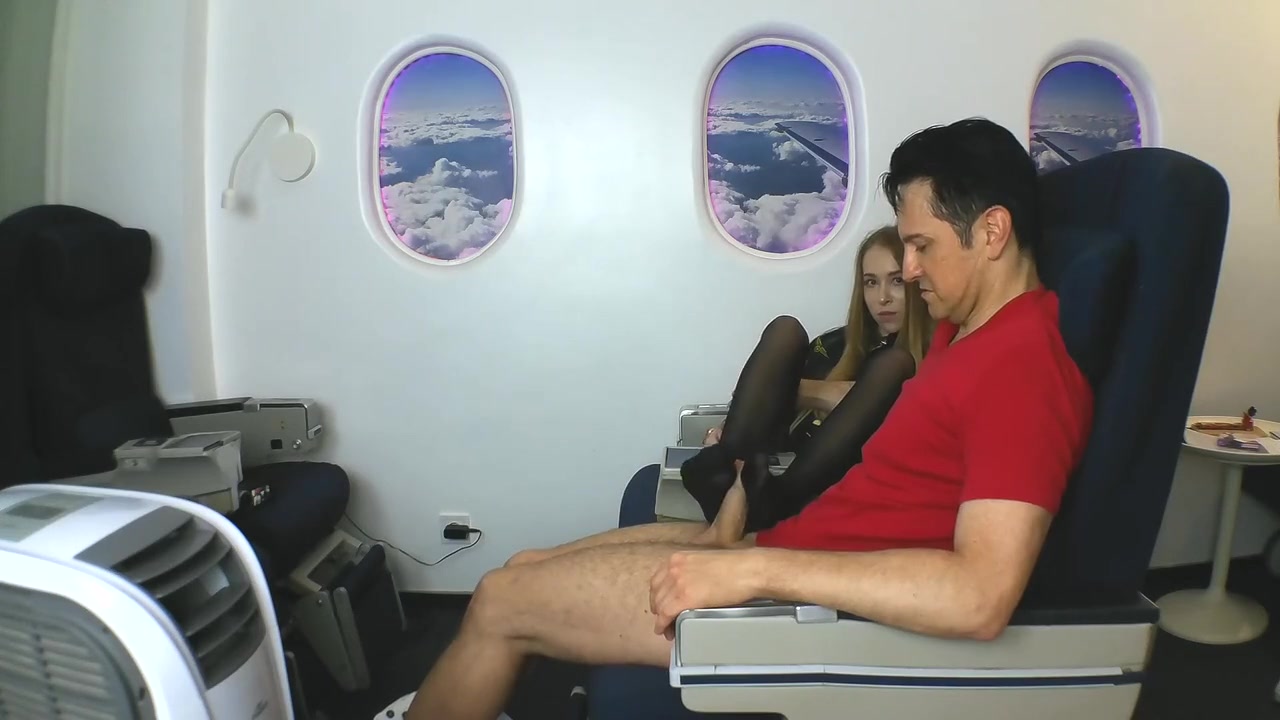 Stewardess gives nylon footjob in plane by Foot Girls