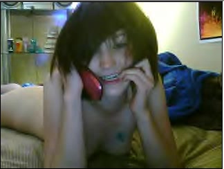 Playful girlfriend phone sexing with her boyfriend