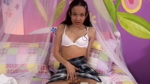 Skinny teen 18+ toys her pussy