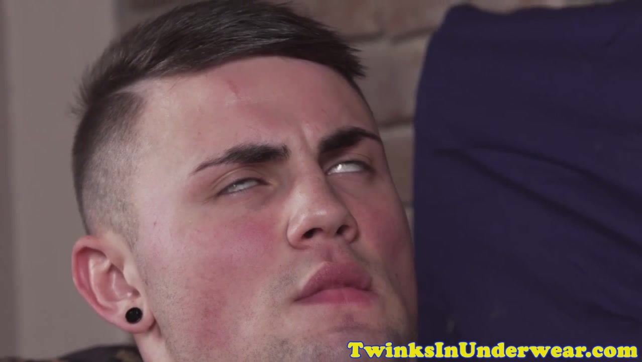Aroused twink jerking his cock during massage
