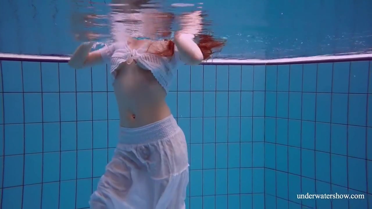 Redhead Marketa In A White Dress In The Pool
