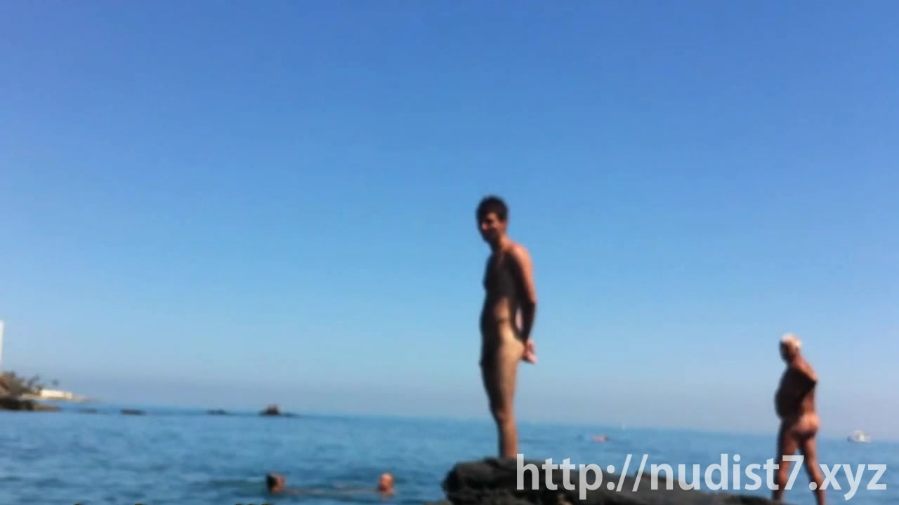 Spying on a cute cutie at the nudist beach cam