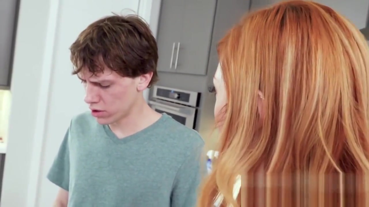 Cooking redhead steams up the kitchen by banging her stepbro on the floor