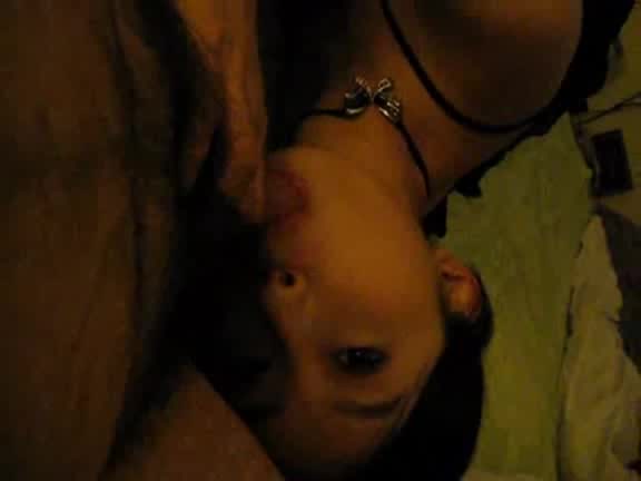 Asian slut in fashionable dress enjoys a good cock sucking