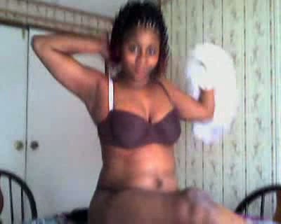 Cute black chick undressing